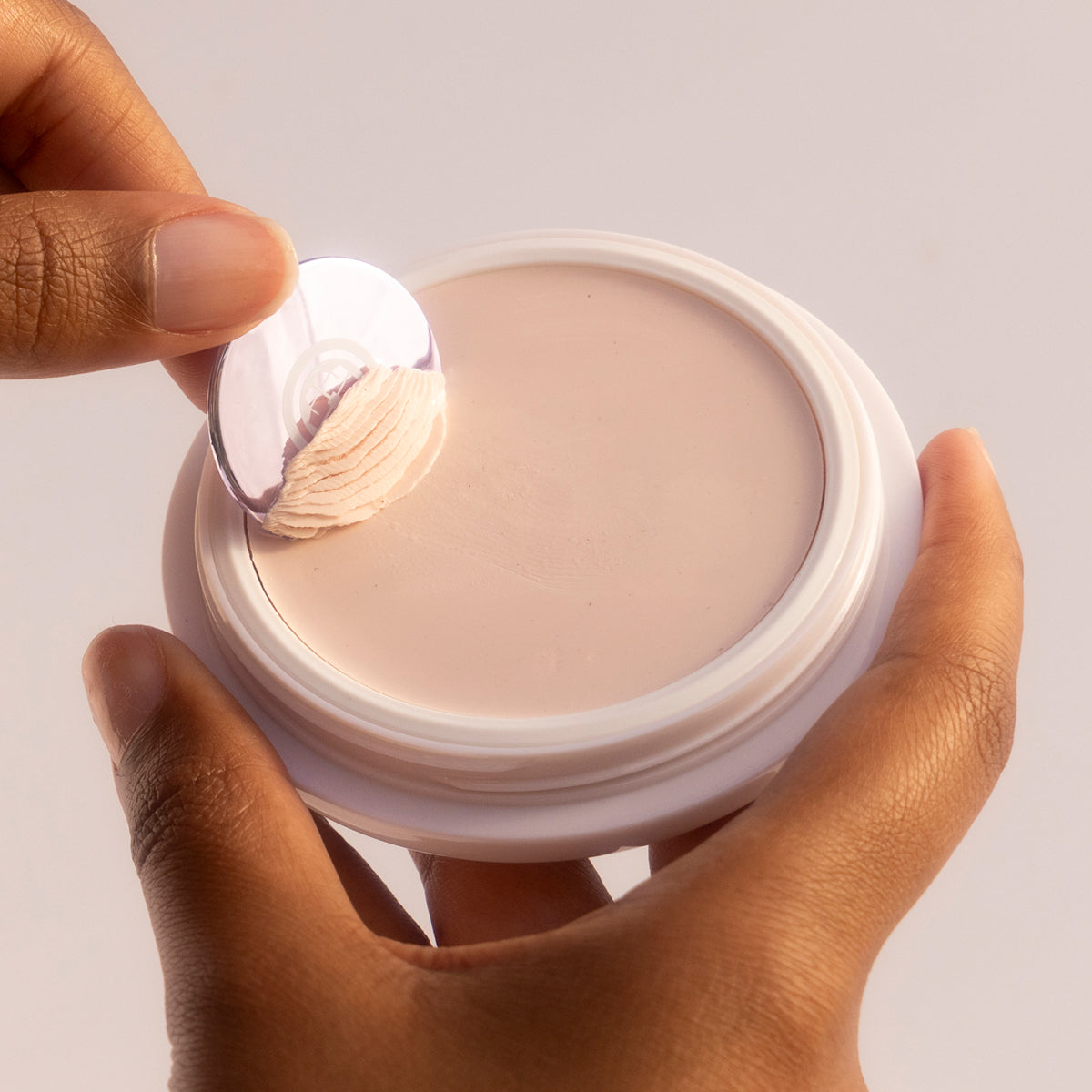 Hand holding a Silk Canvas