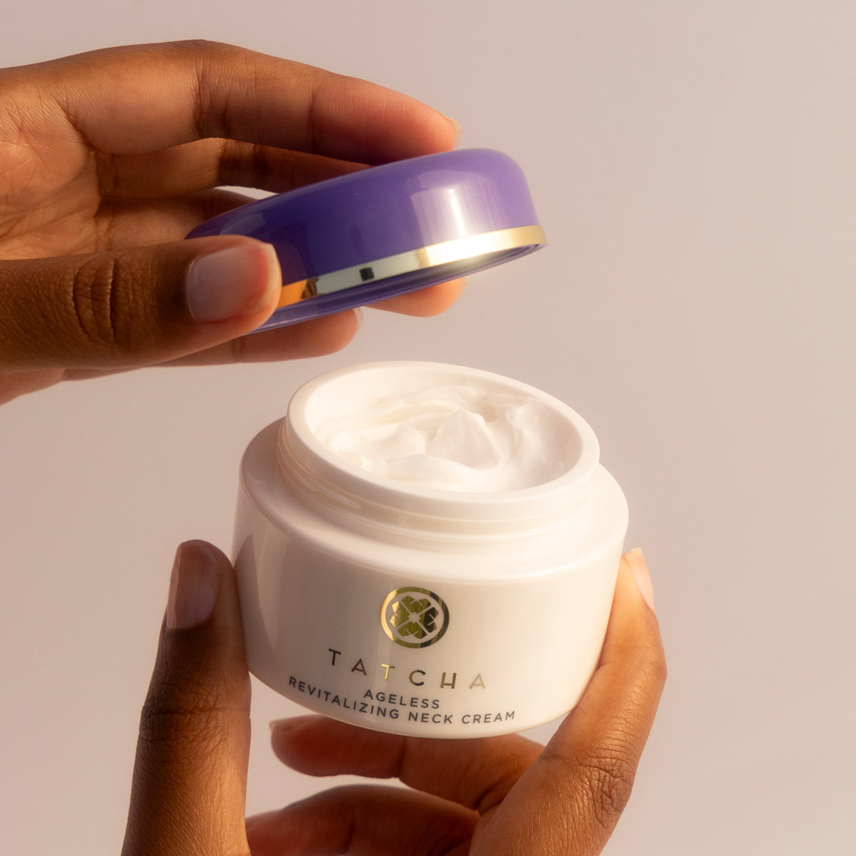 Model opening The Ageless Revitalizing Neck Cream