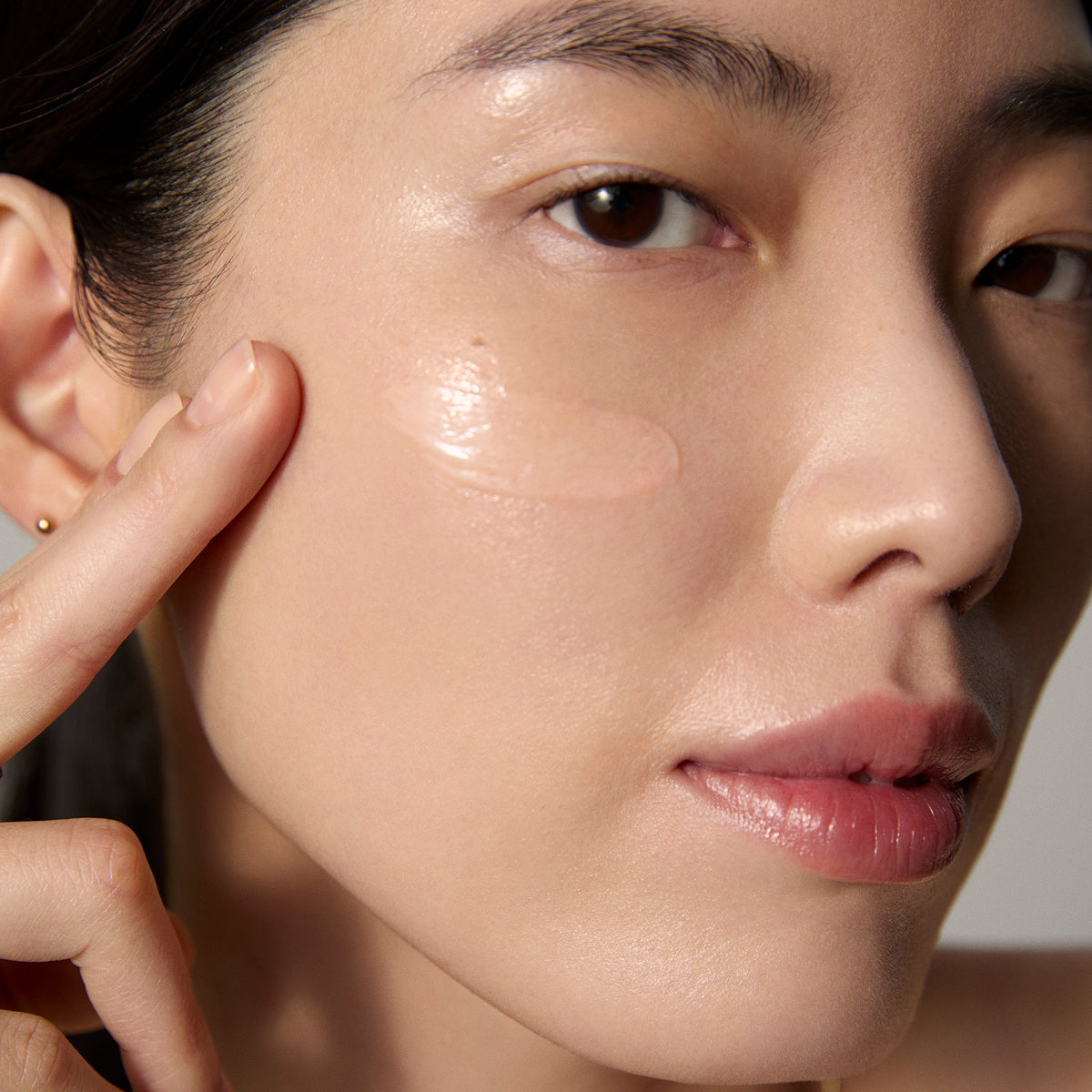 Model application showcasing the Tatcha Brightening Serum