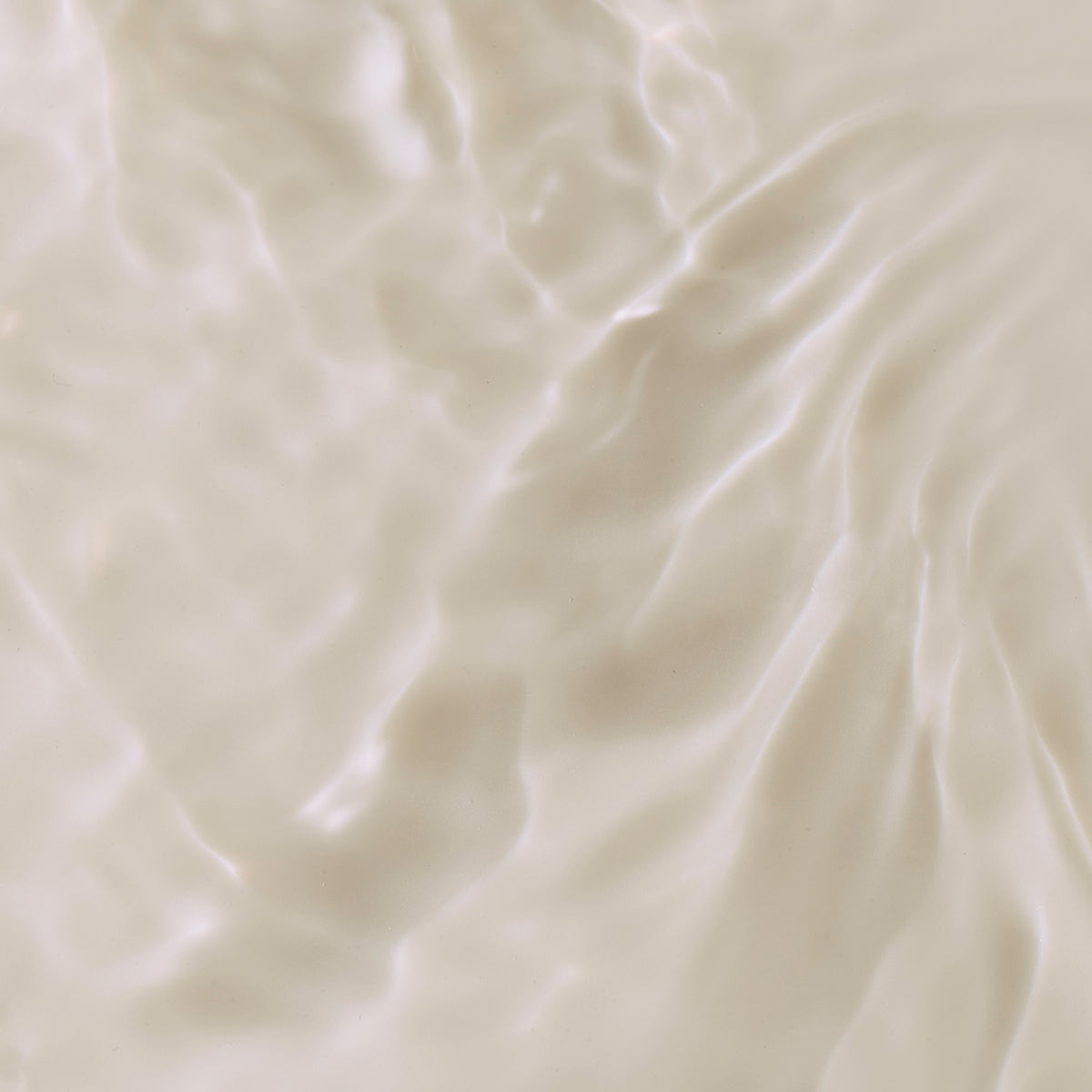 Product texture shot of the Tatcha Essence