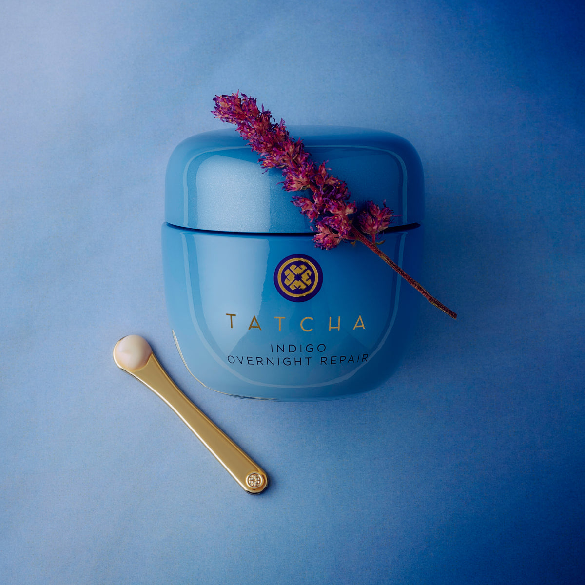 Tatcha Indigo Overnight Repair product shot against indigo blue