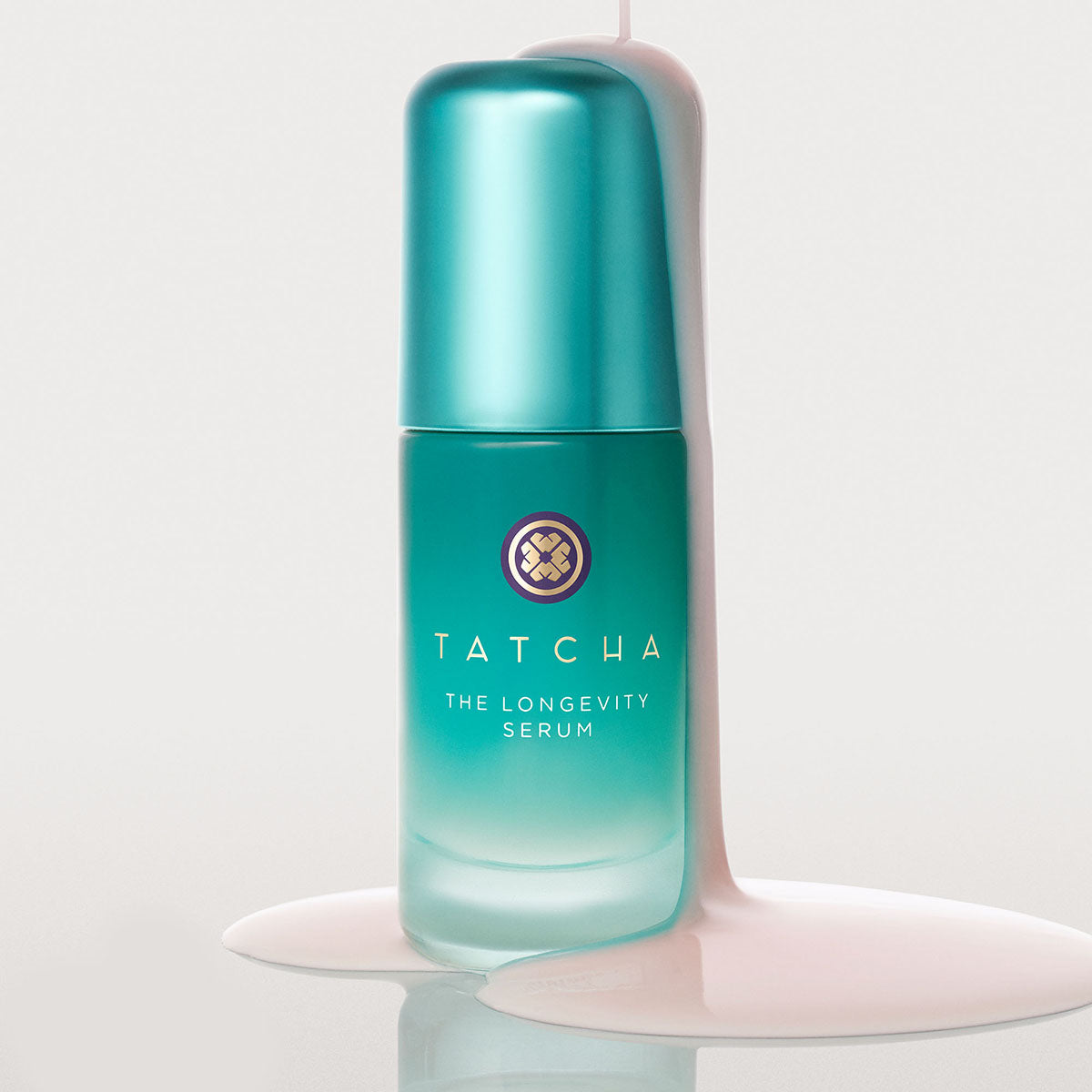 The Longevity Serum pouring on its bottle