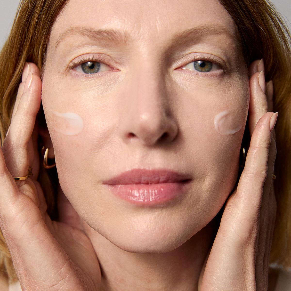 Model application showcasing the Tatcha Silk Cream