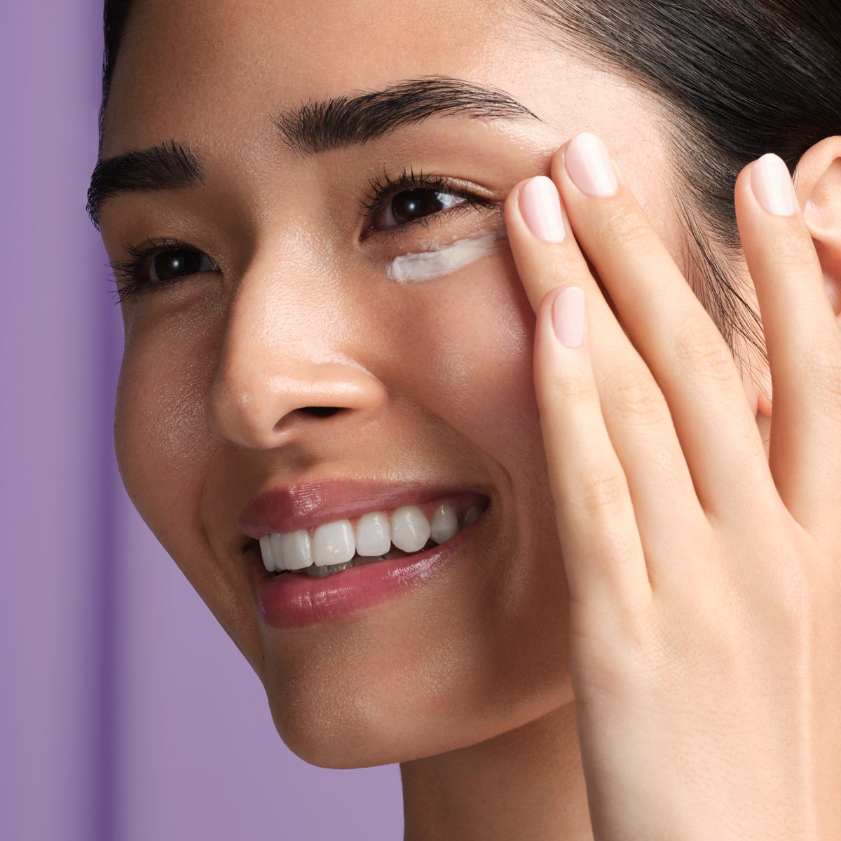 Woman applying The Silk Peony