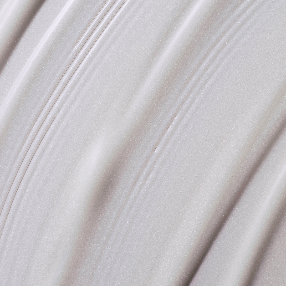 Product texture shot of the Tatcha Silk Serum