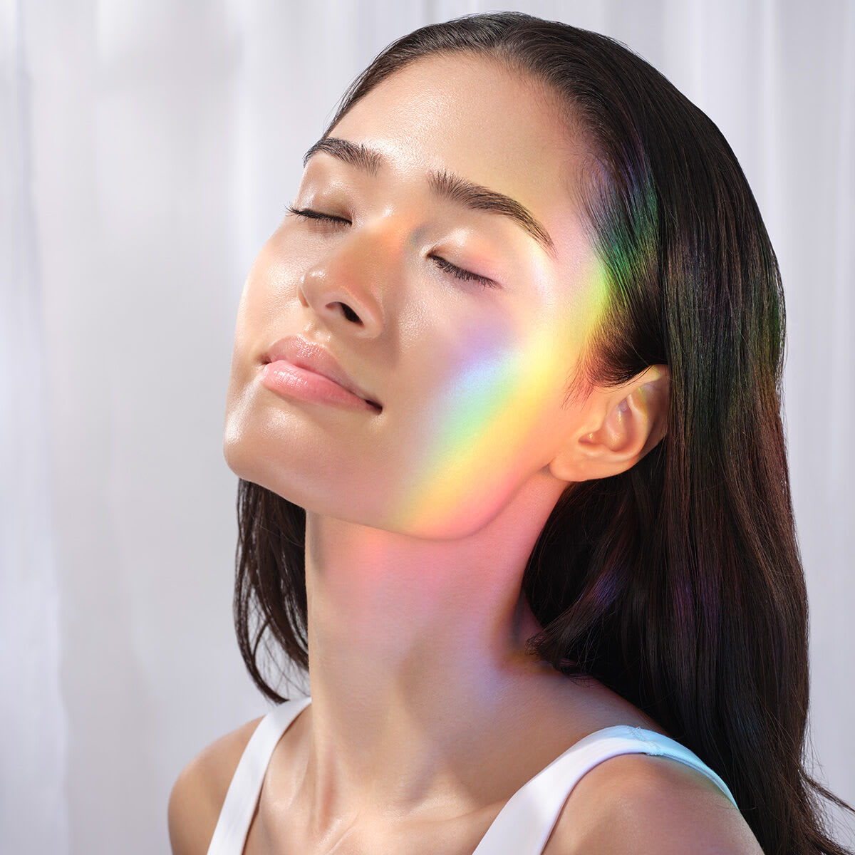 Shot of model after using The Dewy Serum.